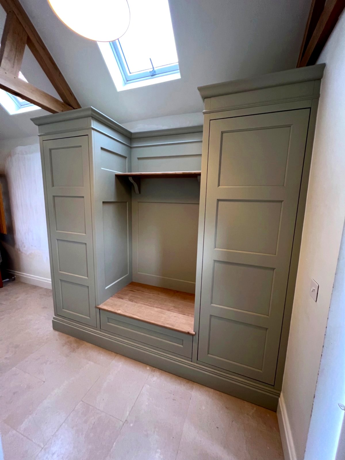 Built‑in wardrobe bench unit installed in a Northamptonshire property